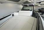 Saxdor 270 GTO - 2023 Saxdor 270 GTO boat interior with cushioned seating in showroom.