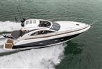 Sunseeker Portofino 47 - 2009 Sunseeker Portofino 47 yacht cruising on open water.