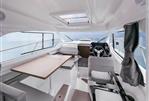 Beneteau Antares 8 - Manufacturer Provided Image: 2024 Beneteau Antares 8 interior with modern seating, dining table, and helm station.
