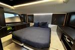 Sunseeker Superhawk 55 - Luxurious bedroom interior of 2024 Sunseeker Superhawk 55 yacht with modern design elements.