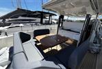 Nimbus T11 T-TOP - 2022 Nimbus T11 T-TOP boat interior with seating and dining area.