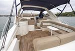 Princess V42 - Luxury 2000 Princess V42 yacht with spacious seating and elegant design on open water.