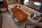 Princess V53 - Luxurious interior of 2006 Princess V53 yacht with elegant dining area and plush seating.
