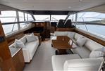 Princess 43 - Luxurious interior of a 2016 Princess 43 yacht with elegant seating and panoramic windows.