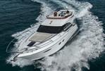 Princess 43 - 2018 Princess 43 yacht cruising on open water, aerial view.