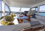 Princess F50 - Luxurious interior of 2022 Princess F50 yacht with elegant seating and panoramic windows.