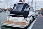 Galeon 485 HTS - 2022 Galeon 485 HTS yacht docked at marina, featuring sleek design and covered deck.
